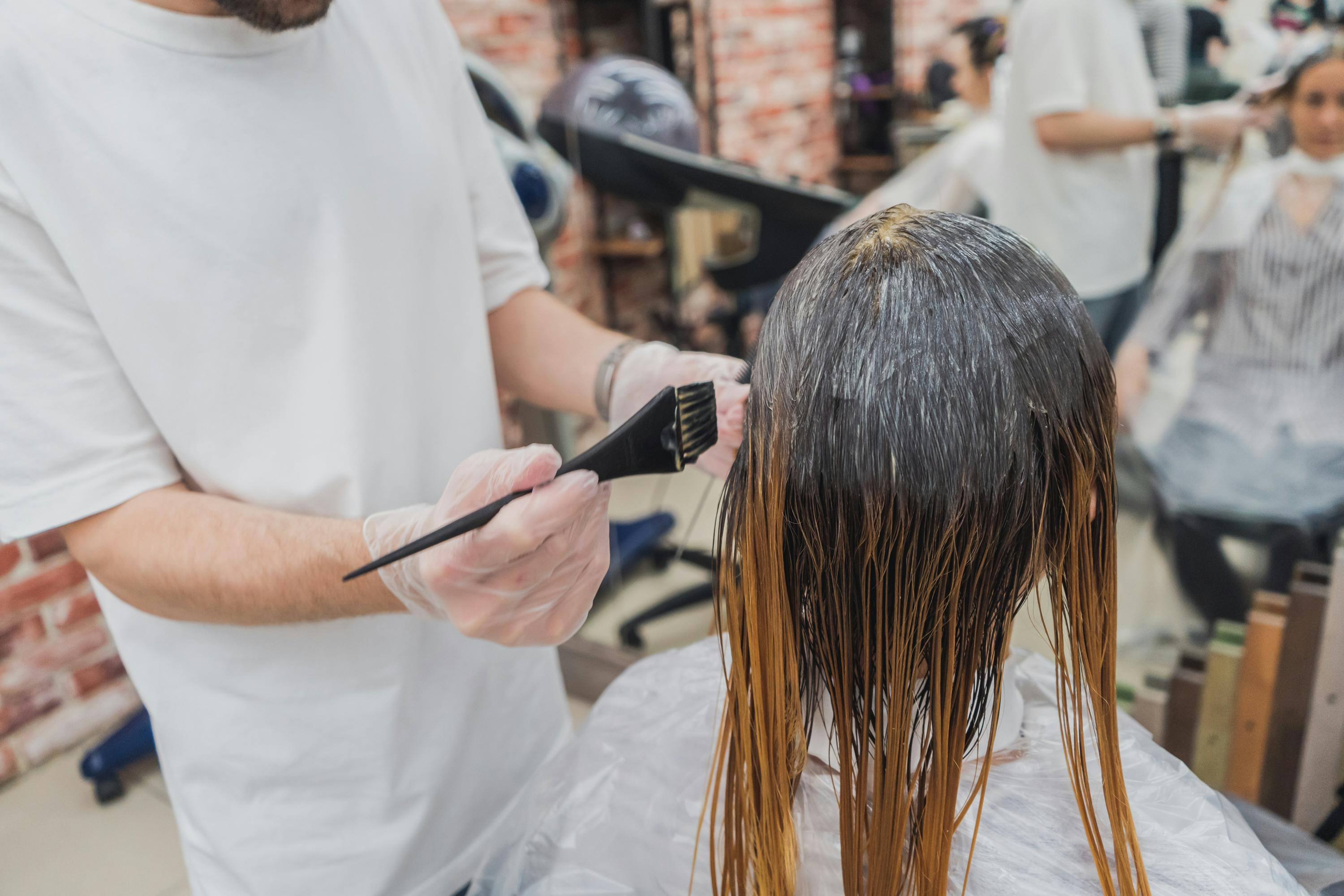 image of someone getting their hair colored